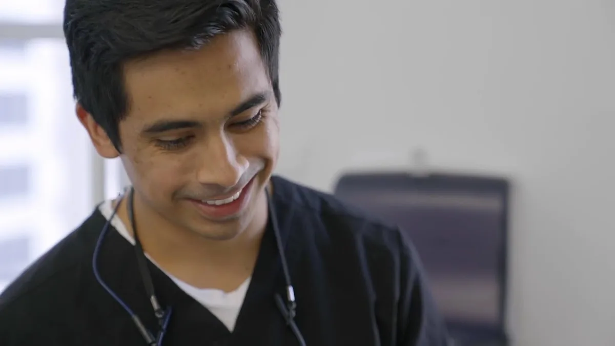 Friendly dental team discussing appointment options